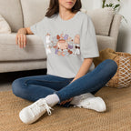 Hocus Pocus Cute Witch graphic shirt featuring Pastel Halloween Cat & Cauldron Tee