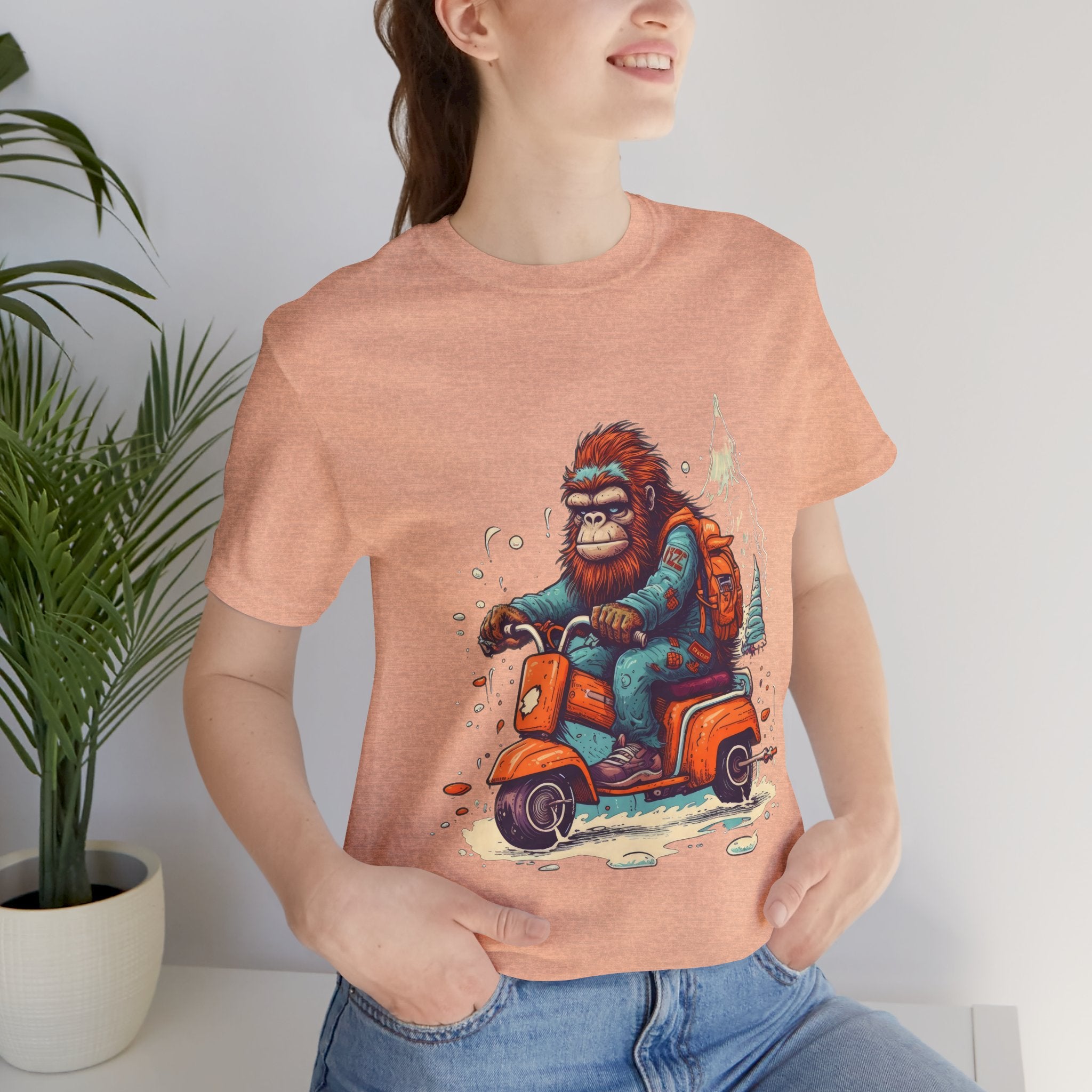 Bigfoot Scooter Graphic Tee — Retro Bigfoot Riding Vespa Adventure T-Shirt