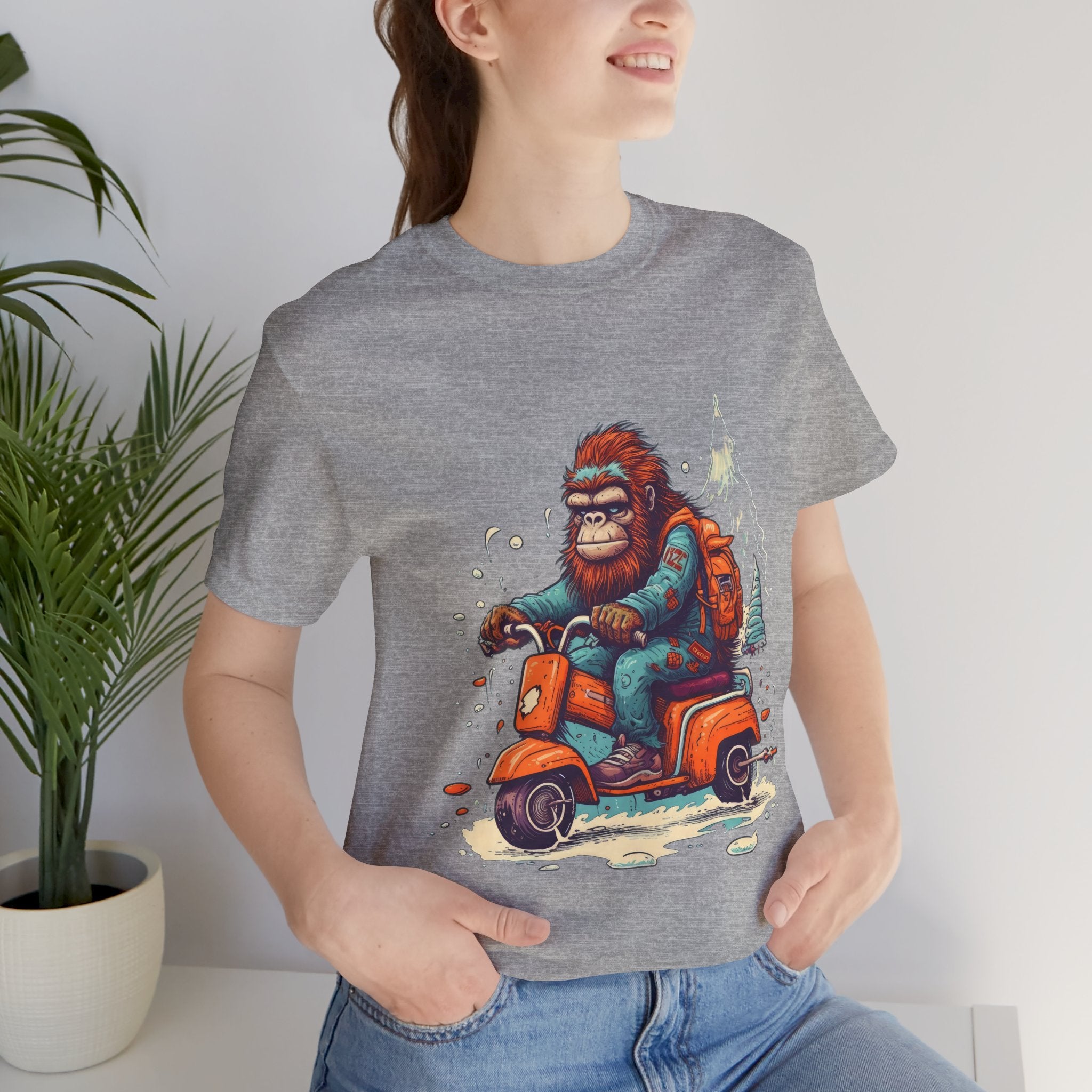 Bigfoot Scooter Graphic Tee — Retro Bigfoot Riding Vespa Adventure T-Shirt