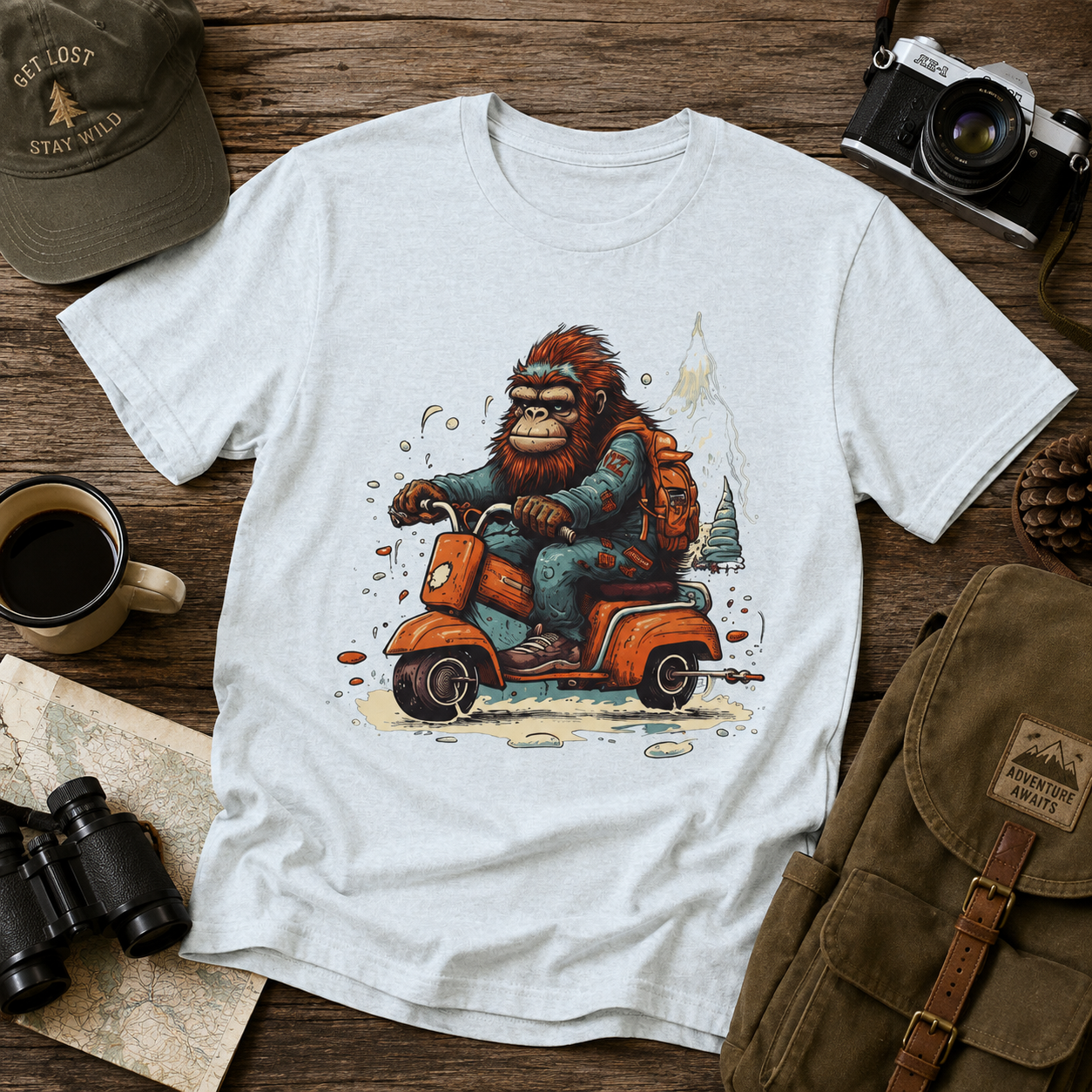 Bigfoot Scooter Graphic Tee — Retro Bigfoot Riding Vespa Adventure T-Shirt