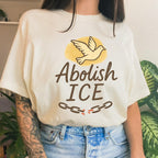 Abolish ICE graphic shirt featuring Dove Freedom Protest Tee