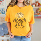 Abolish ICE graphic shirt featuring Dove Freedom Protest Tee