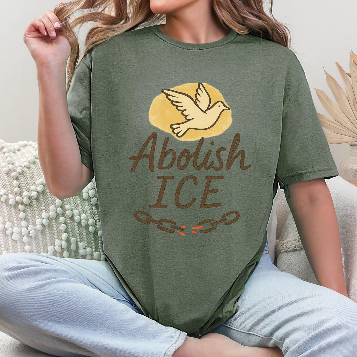 Abolish ICE graphic shirt featuring Dove Freedom Protest Tee