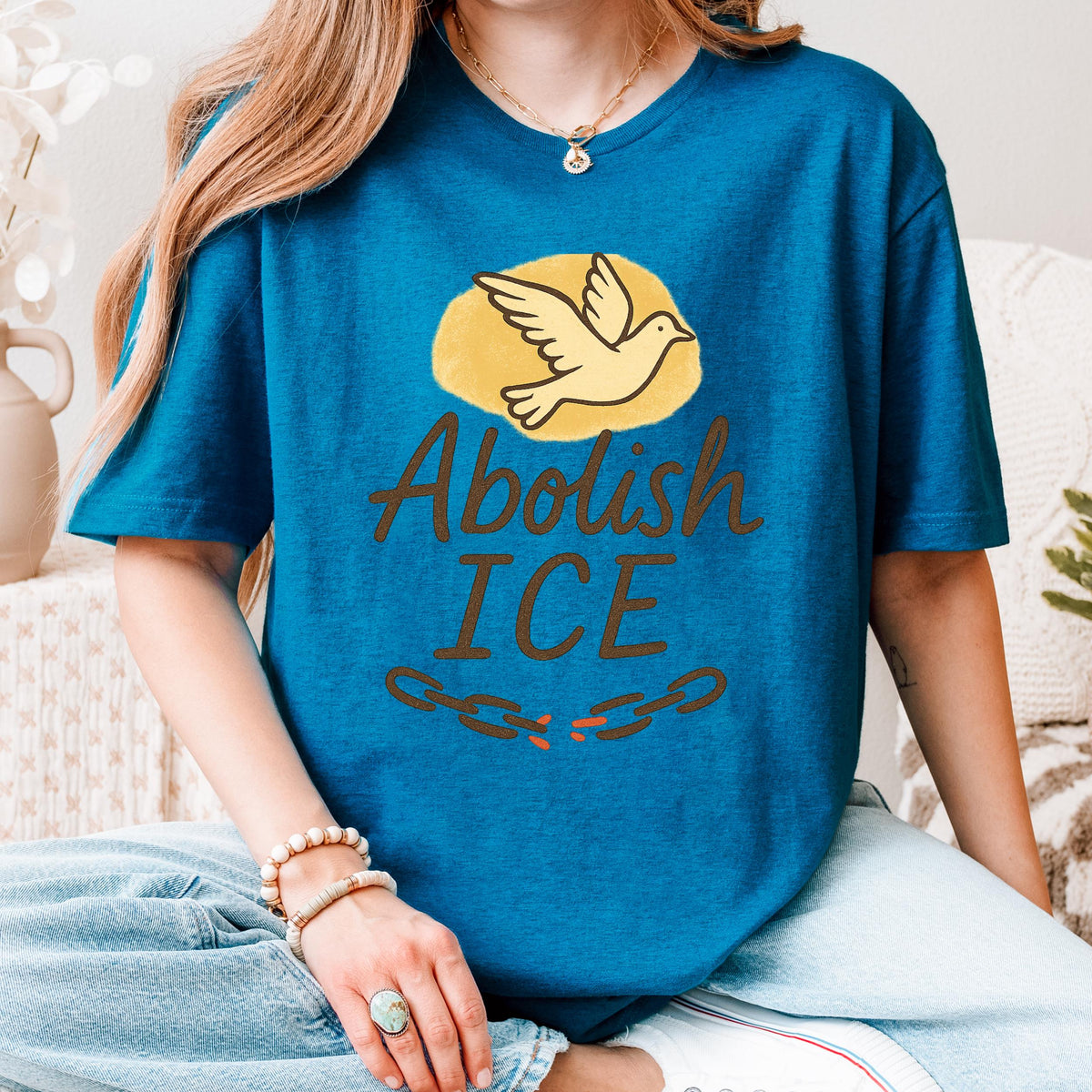 Abolish ICE graphic shirt featuring Dove Freedom Protest Tee