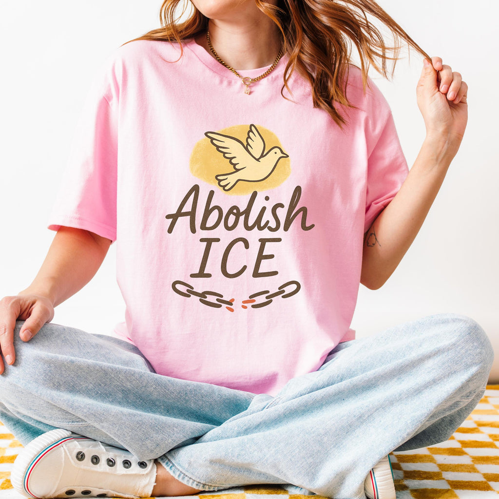 Abolish ICE graphic shirt featuring Dove Freedom Protest Tee