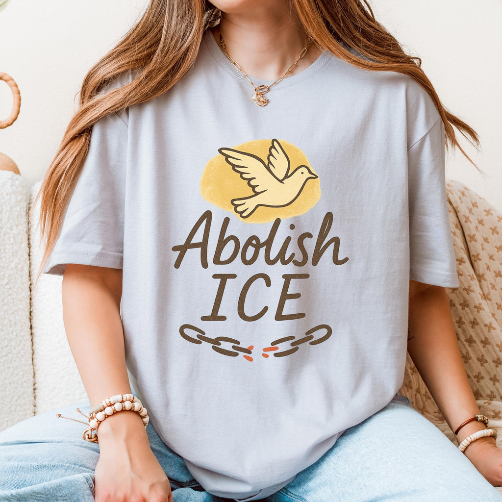 Abolish ICE graphic shirt featuring Dove Freedom Protest Tee