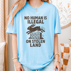 No Human Is Illegal T‑ graphic shirt featuring Social Justice Immigration Message