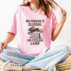 No Human Is Illegal T‑ graphic shirt featuring Social Justice Immigration Message