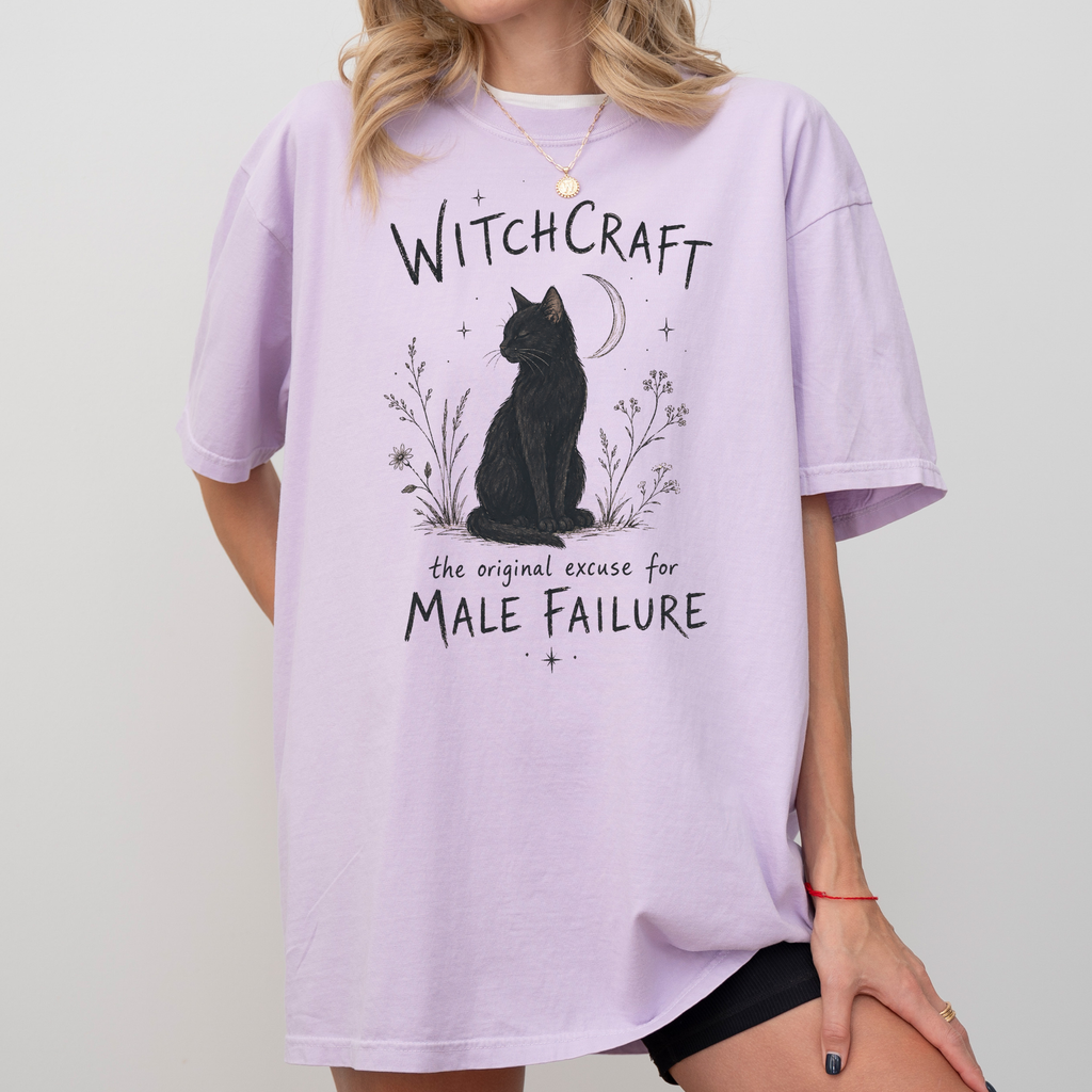 Witchcraft Cat graphic shirt featuring 'The Original Excuse for Male Failure'
