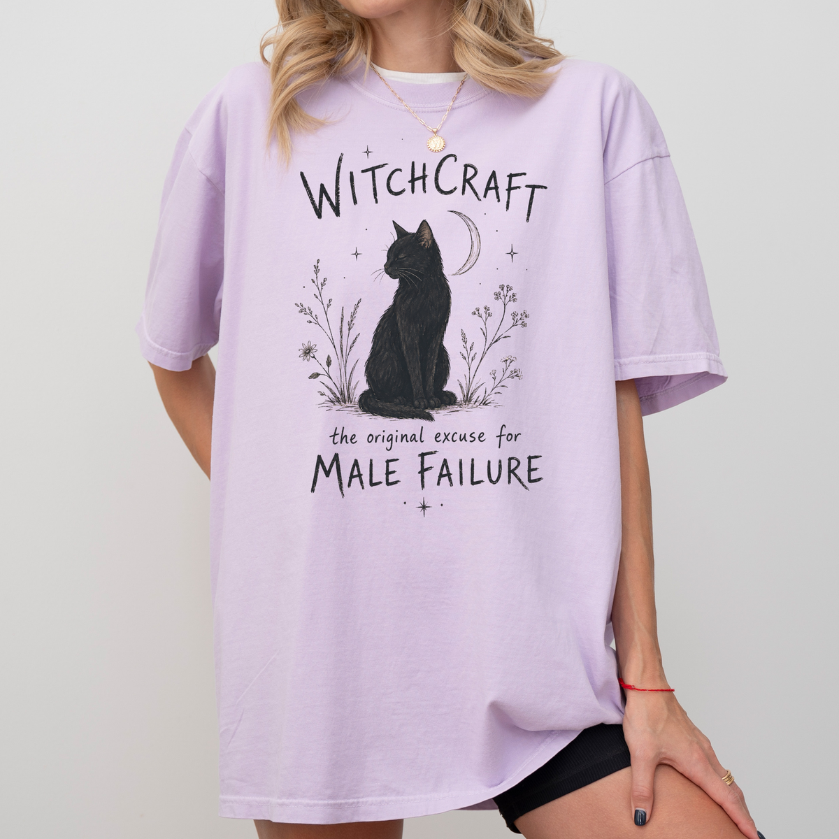 Witchcraft Cat graphic shirt featuring 'The Original Excuse for Male Failure'