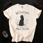 Witchcraft Cat graphic shirt featuring 'The Original Excuse for Male Failure'
