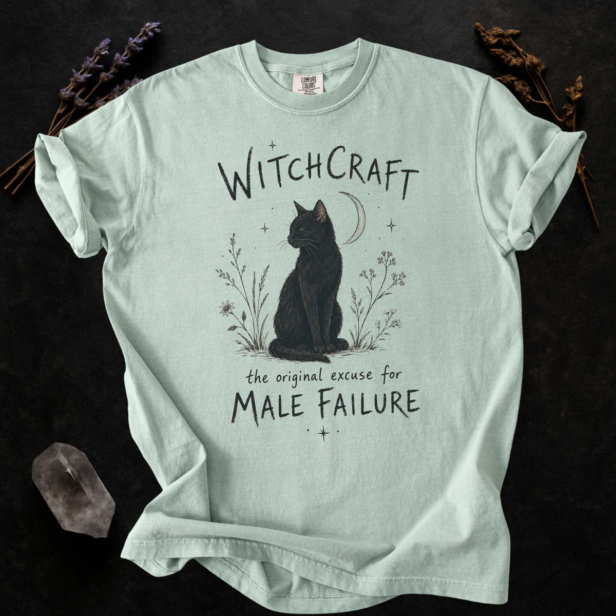 Witchcraft Cat graphic shirt featuring 'The Original Excuse for Male Failure'