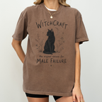 Witchcraft Cat graphic shirt featuring 'The Original Excuse for Male Failure'