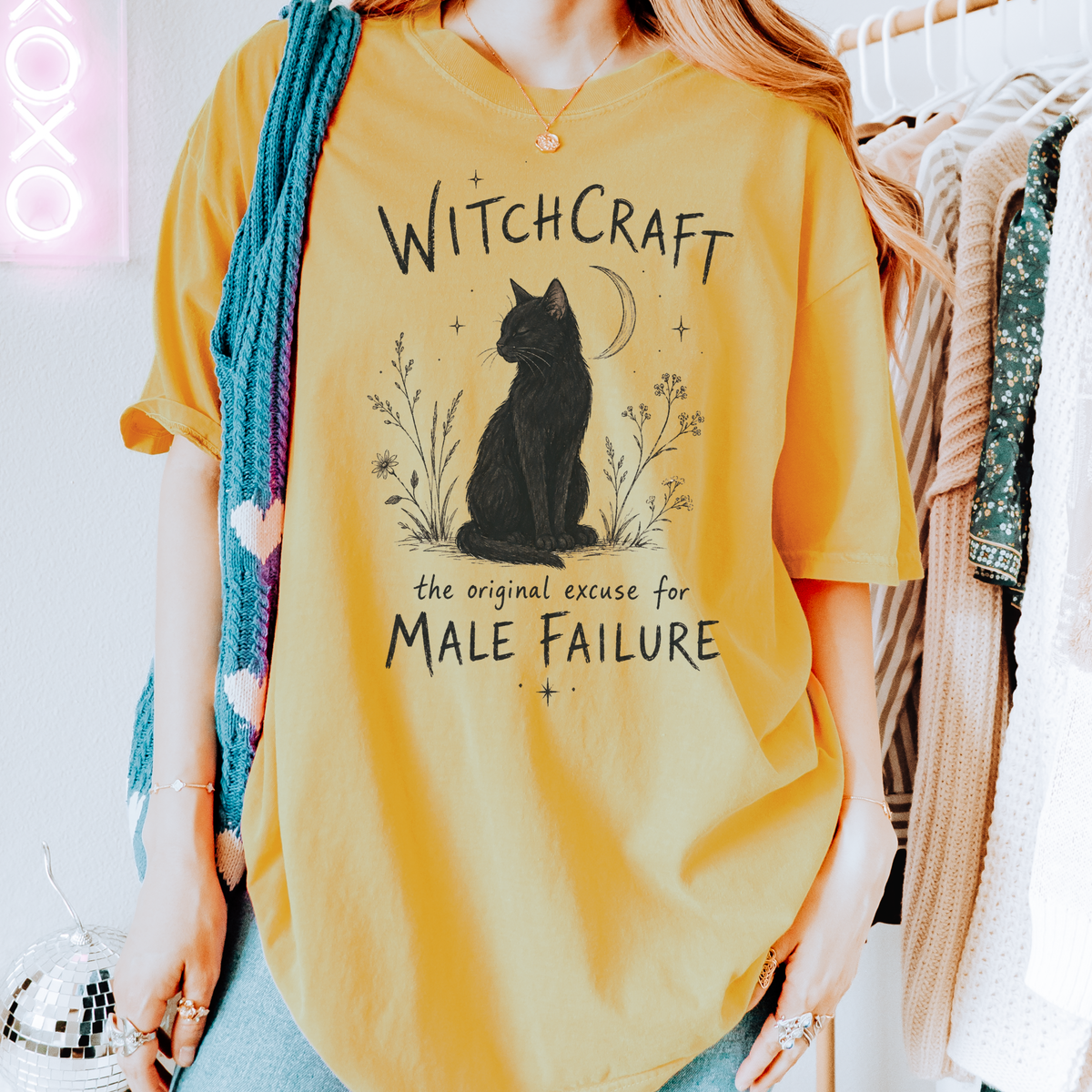 Witchcraft Cat graphic shirt featuring 'The Original Excuse for Male Failure'