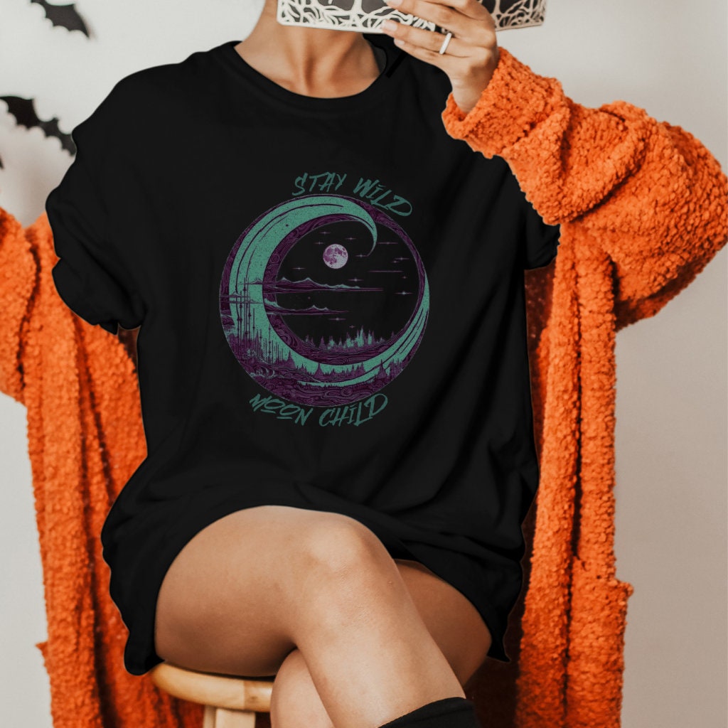 Stay Wild Moon Child graphic shirt featuring Crescent Moon Nature Graphic Tee