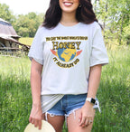 Graphic graphic shirt featuring "You Say the Whole World’s Ending Honey It