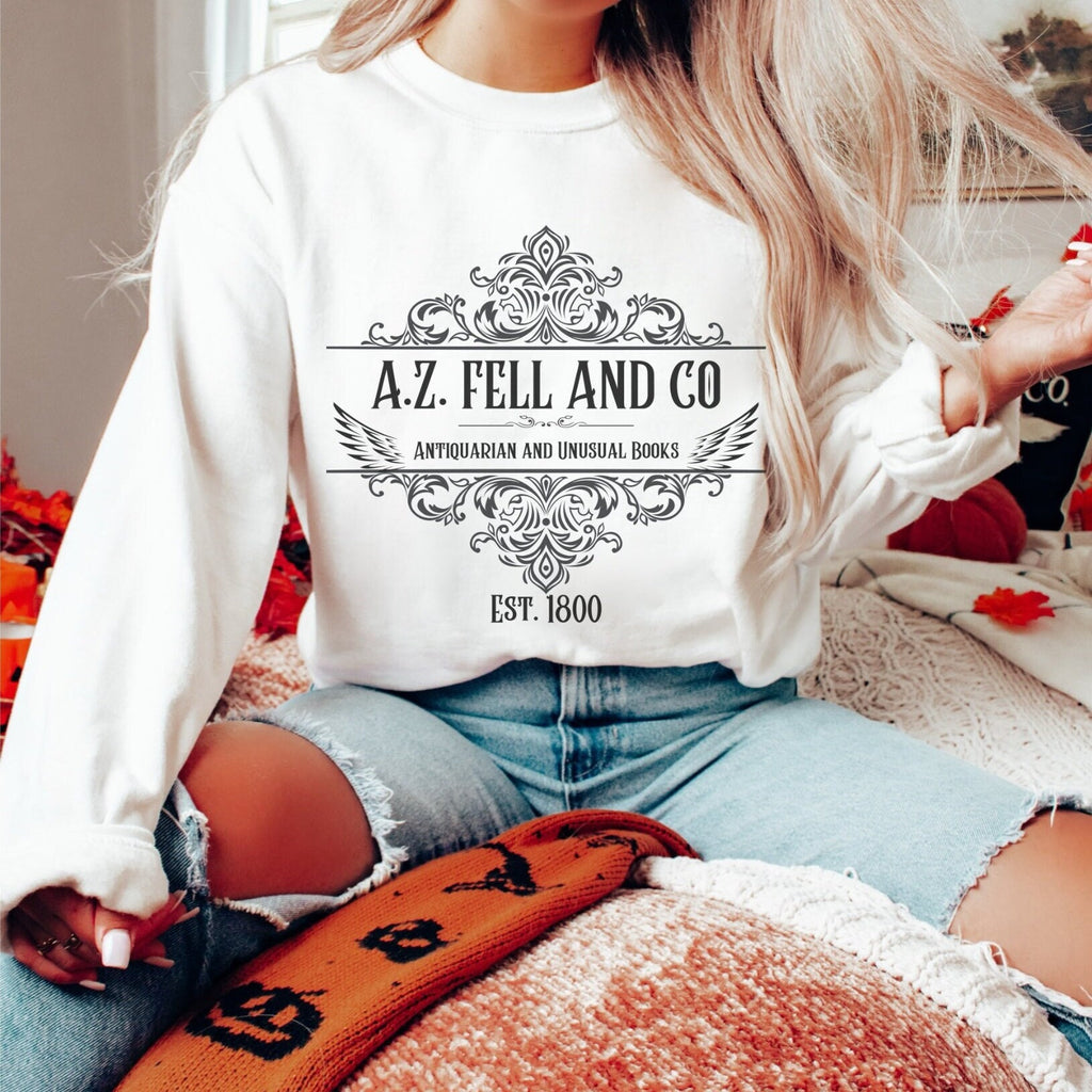 A.Z. Fell and Co graphic sweatshirt featuring Good Omens Aziraphale Bookshop Crewneck in Black
