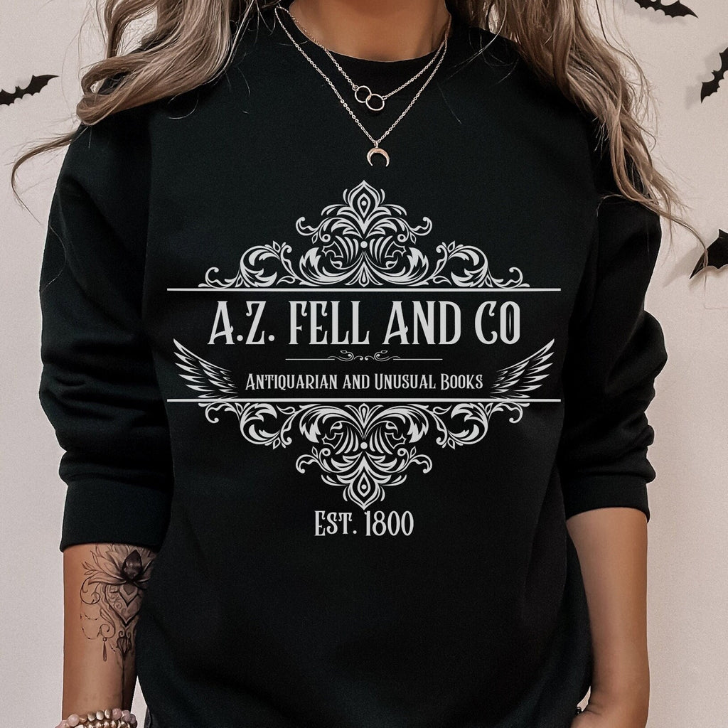 A.Z. Fell and Co graphic sweatshirt featuring Good Omens Aziraphale Bookshop Crewneck