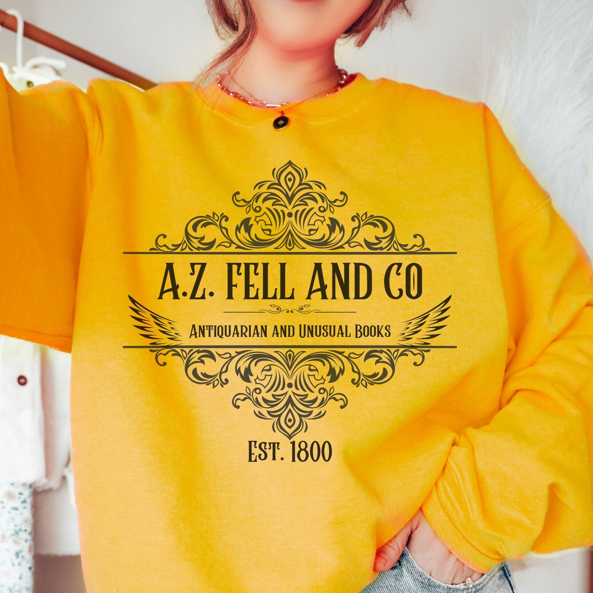 A.Z. Fell and Co graphic sweatshirt featuring Good Omens Aziraphale Bookshop Crewneck