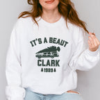 Crewneck Sweatshirt graphic sweatshirt featuring "It's a Beaut Clark 1989" Vintage Tree-Laden