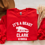 Crewneck Sweatshirt graphic sweatshirt featuring "It's a Beaut Clark 1989" Vintage Tree-Laden