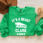 Crewneck Sweatshirt graphic sweatshirt featuring "It's a Beaut Clark 1989" Vintage Tree-Laden