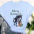 Creepy Krampus Christmas graphic shirt featuring "Merry Krampus" Vintage Holiday Tee
