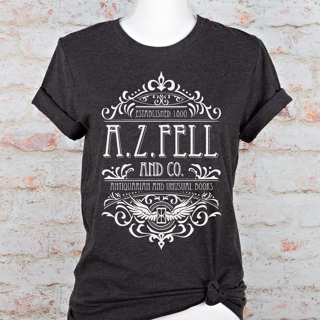 Good Omens A.Z. Fell and Co Antiquarian and Unusual graphic shirt featuring Aziraphale & Crowley Bookish Tee in Black