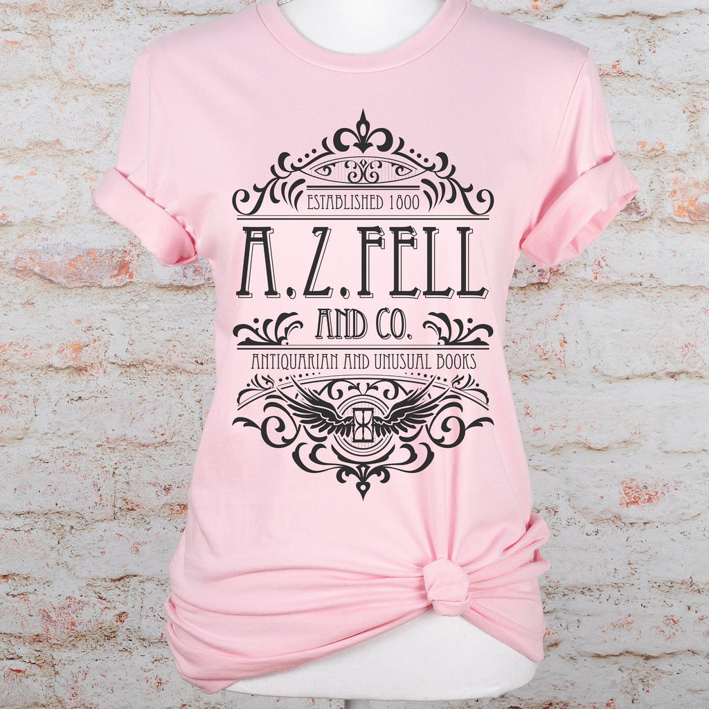 Good Omens A.Z. Fell and Co Antiquarian and Unusual graphic shirt featuring Aziraphale & Crowley Bookish Tee