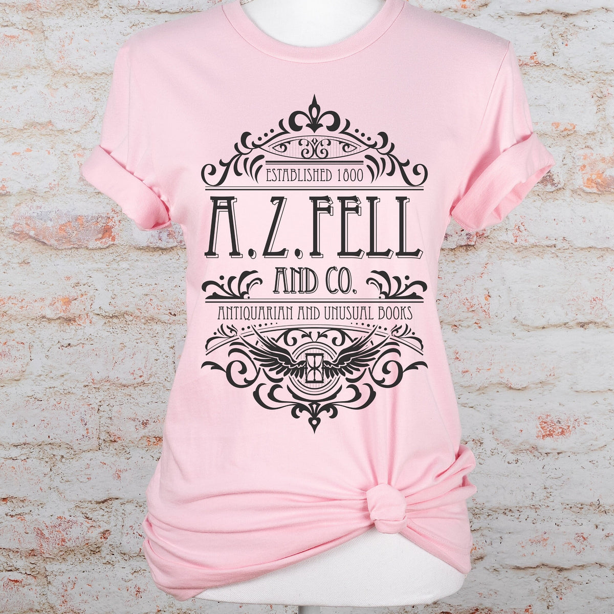 Good Omens A.Z. Fell and Co Antiquarian and Unusual graphic shirt featuring Aziraphale & Crowley Bookish Tee