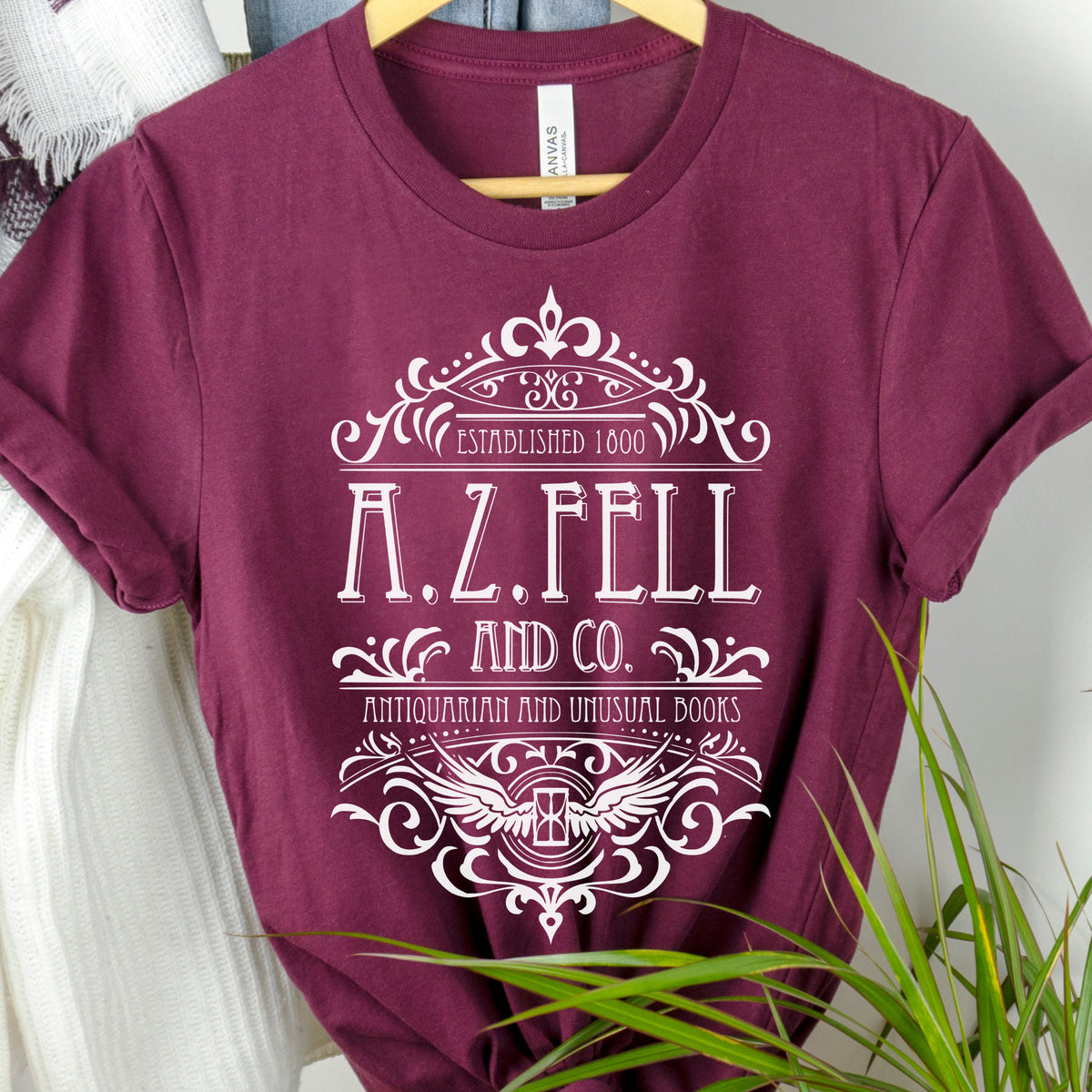 Good Omens A.Z. Fell and Co Antiquarian and Unusual graphic shirt featuring Aziraphale & Crowley Bookish Tee