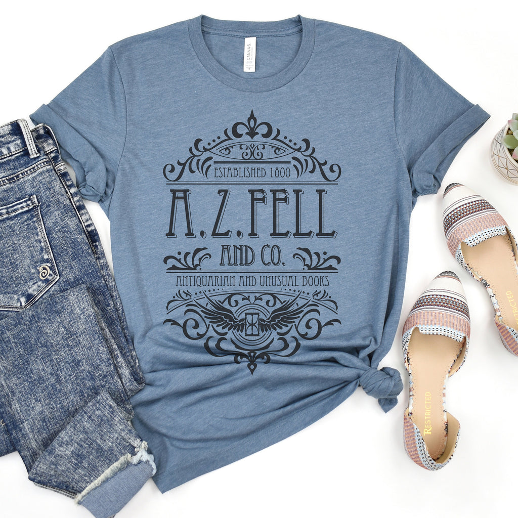 Good Omens A.Z. Fell and Co Antiquarian and Unusual graphic shirt featuring Aziraphale & Crowley Bookish Tee