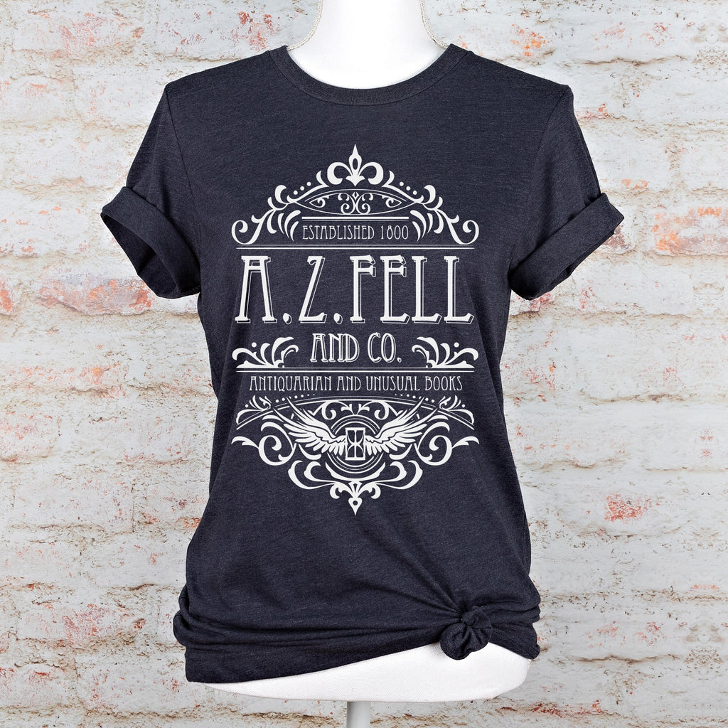 Good Omens A.Z. Fell and Co Antiquarian and Unusual graphic shirt featuring Aziraphale & Crowley Bookish Tee