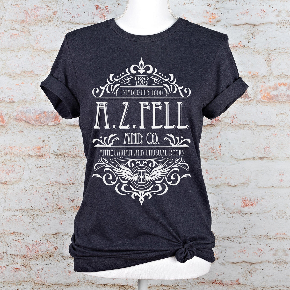 Good Omens A.Z. Fell and Co Antiquarian and Unusual graphic shirt featuring Aziraphale & Crowley Bookish Tee