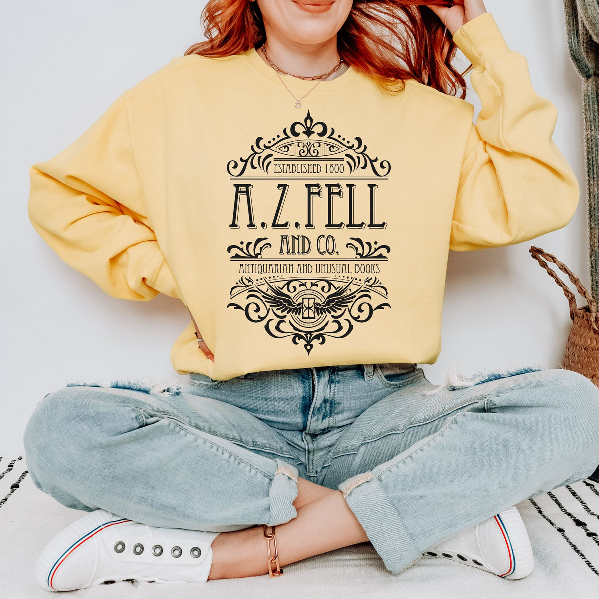 Good Omens A.Z. Fell and Co Antiquarian and Unusual graphic sweatshirt featuring Aziraphale & Crowley Comfort Colors Crewneck