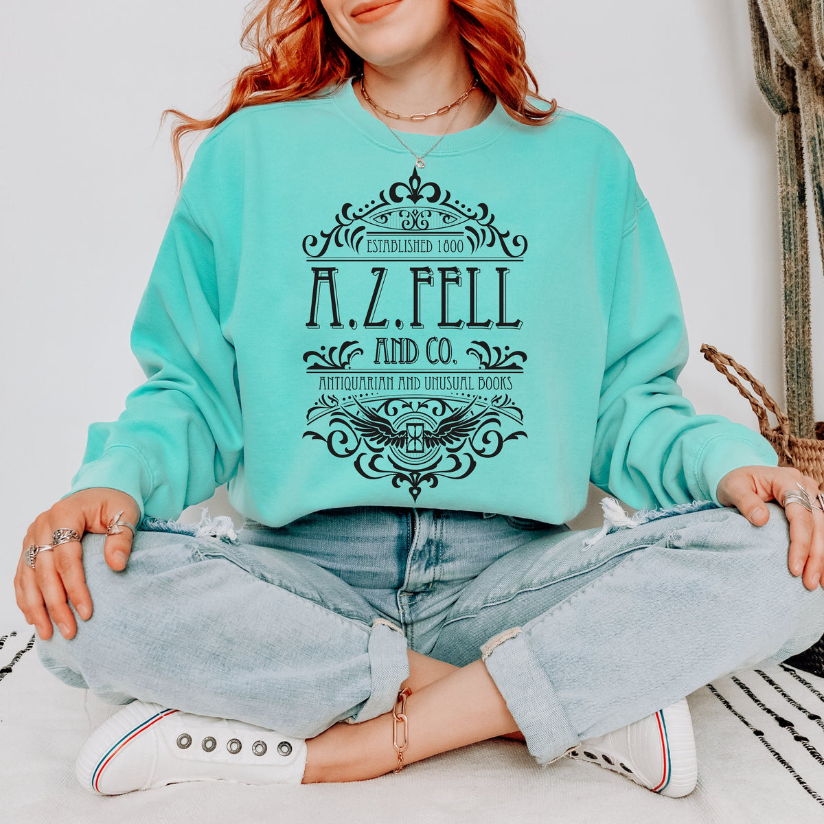 Good Omens A.Z. Fell and Co Antiquarian and Unusual graphic sweatshirt featuring Aziraphale & Crowley Comfort Colors Crewneck