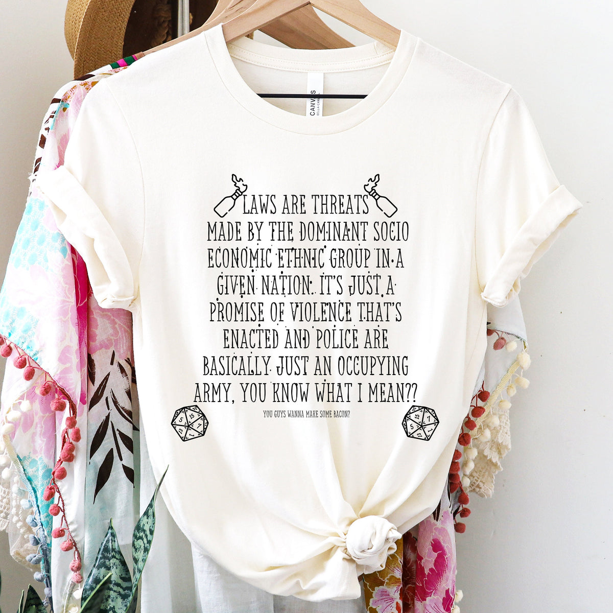 Laws Are Threats graphic shirt featuring Dimension 20