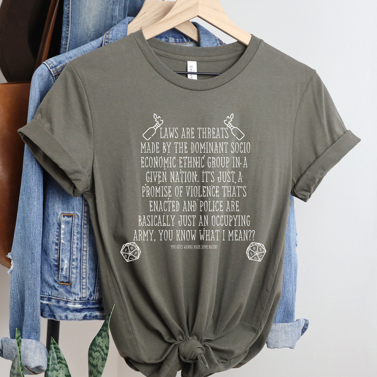 Laws Are Threats graphic shirt featuring Dimension 20