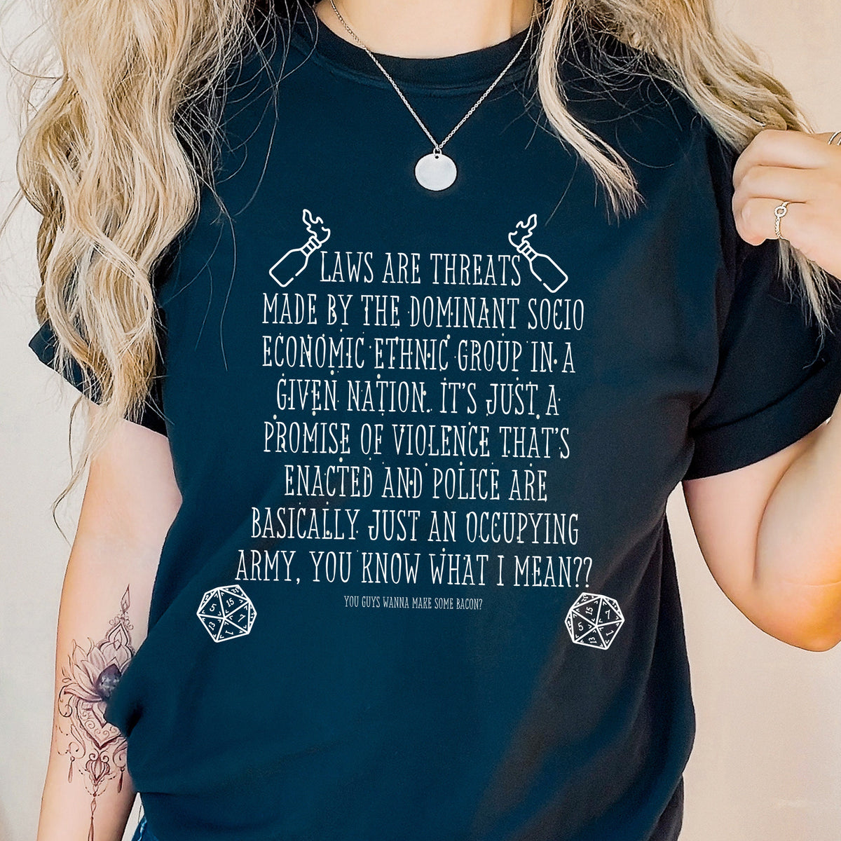 Laws Are Threats graphic shirt featuring Dimension 20