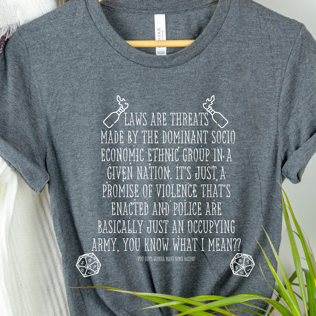 Laws Are Threats graphic shirt featuring Dimension 20