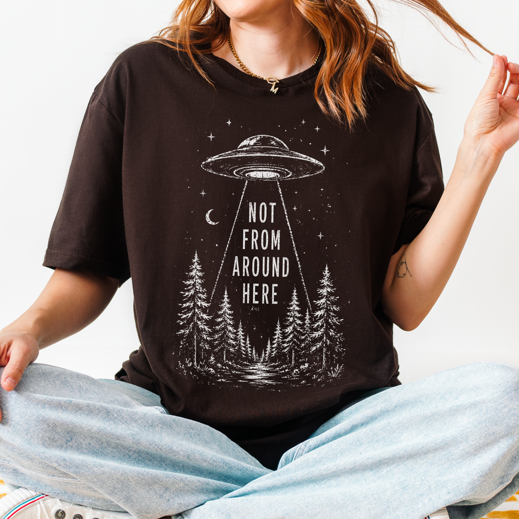 UFO Abduction graphic shirt featuring Not From Around Here Alien Forest Graphic