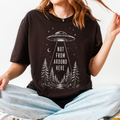 UFO Abduction graphic shirt featuring Not From Around Here Alien Forest Graphic