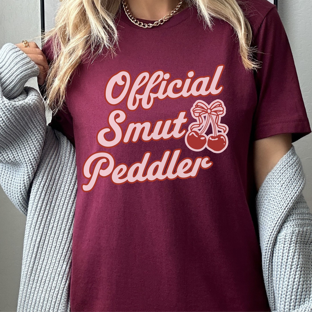 Official Smut Peddler graphic shirt featuring Spicy Bookish Tee & Romance Reader