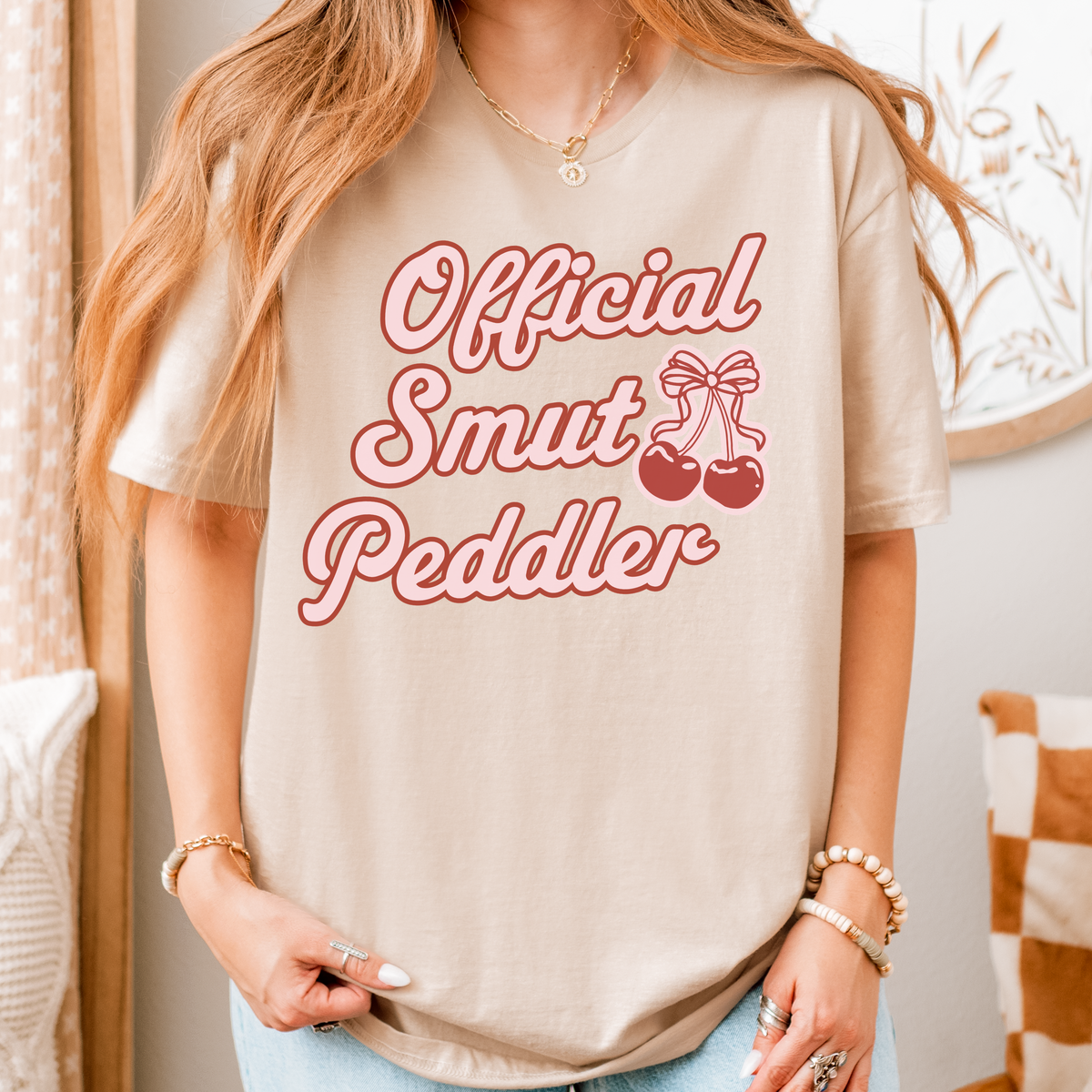 Official Smut Peddler graphic shirt featuring Spicy Bookish Tee & Romance Reader
