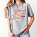 Official Smut Peddler graphic shirt featuring Spicy Bookish Tee & Romance Reader
