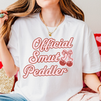 Official Smut Peddler graphic shirt featuring Spicy Bookish Tee & Romance Reader