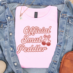 Official Smut Peddler graphic shirt featuring Spicy Bookish Tee & Romance Reader
