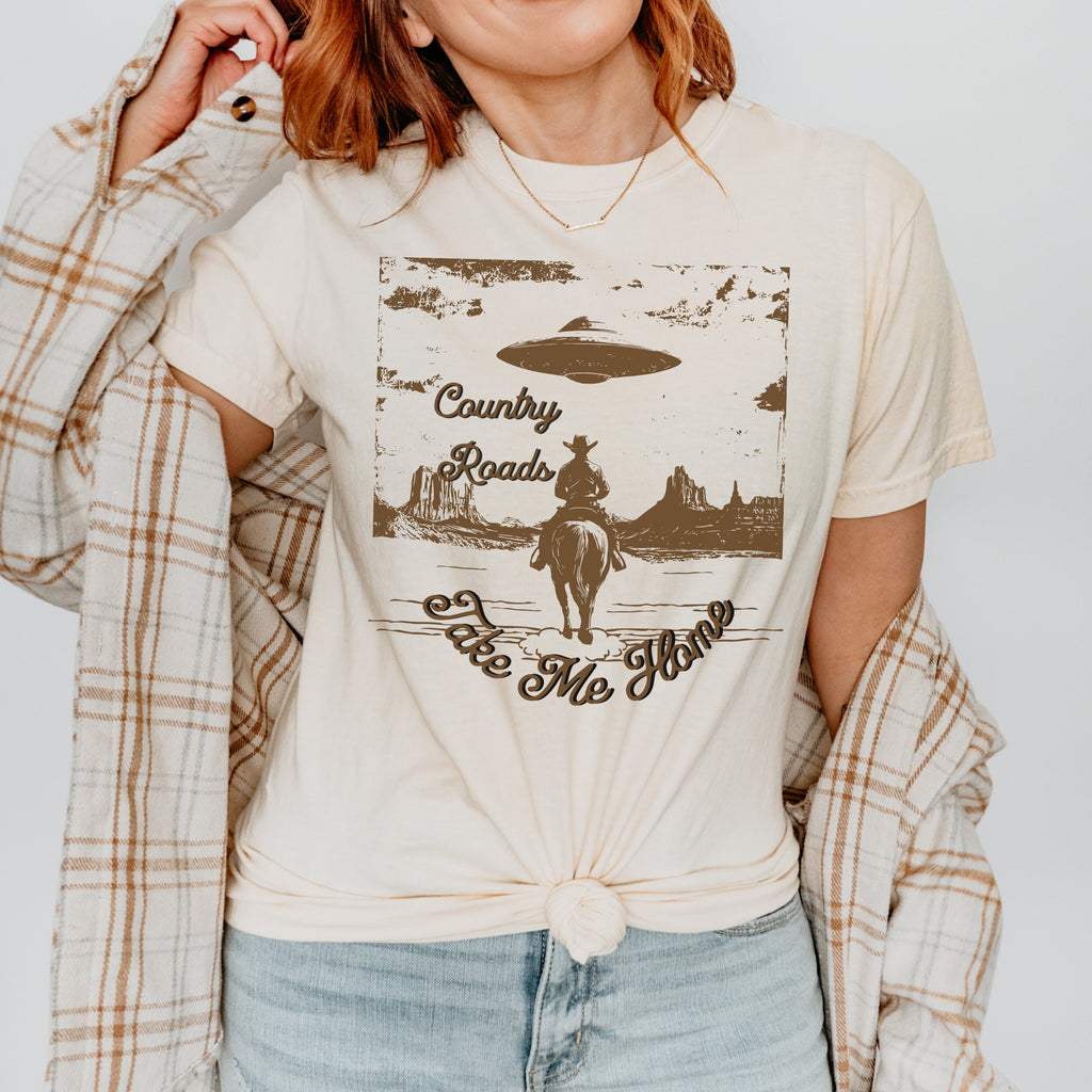 Country Roads Take Me Home graphic shirt featuring Cowboy UFO Western Graphic Tee