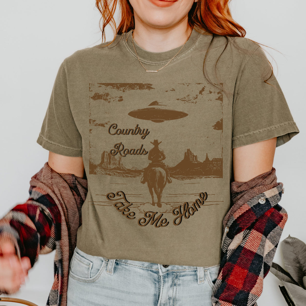 Country Roads Take Me Home graphic shirt featuring Cowboy UFO Western Graphic Tee