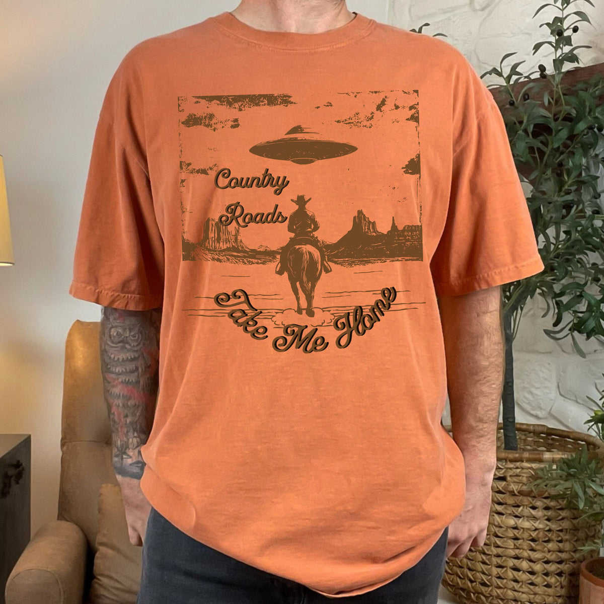 Country Roads Take Me Home graphic shirt featuring Cowboy UFO Western Graphic Tee